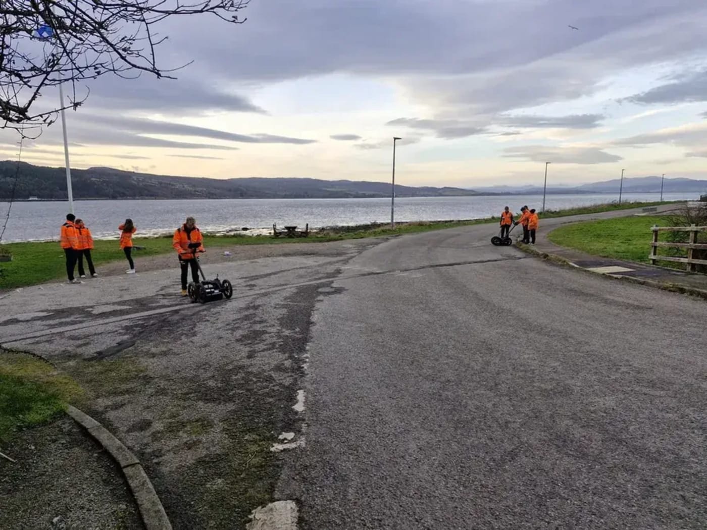 Sygma delegates running ground-penetrating radar survey lines in open coastal ground
