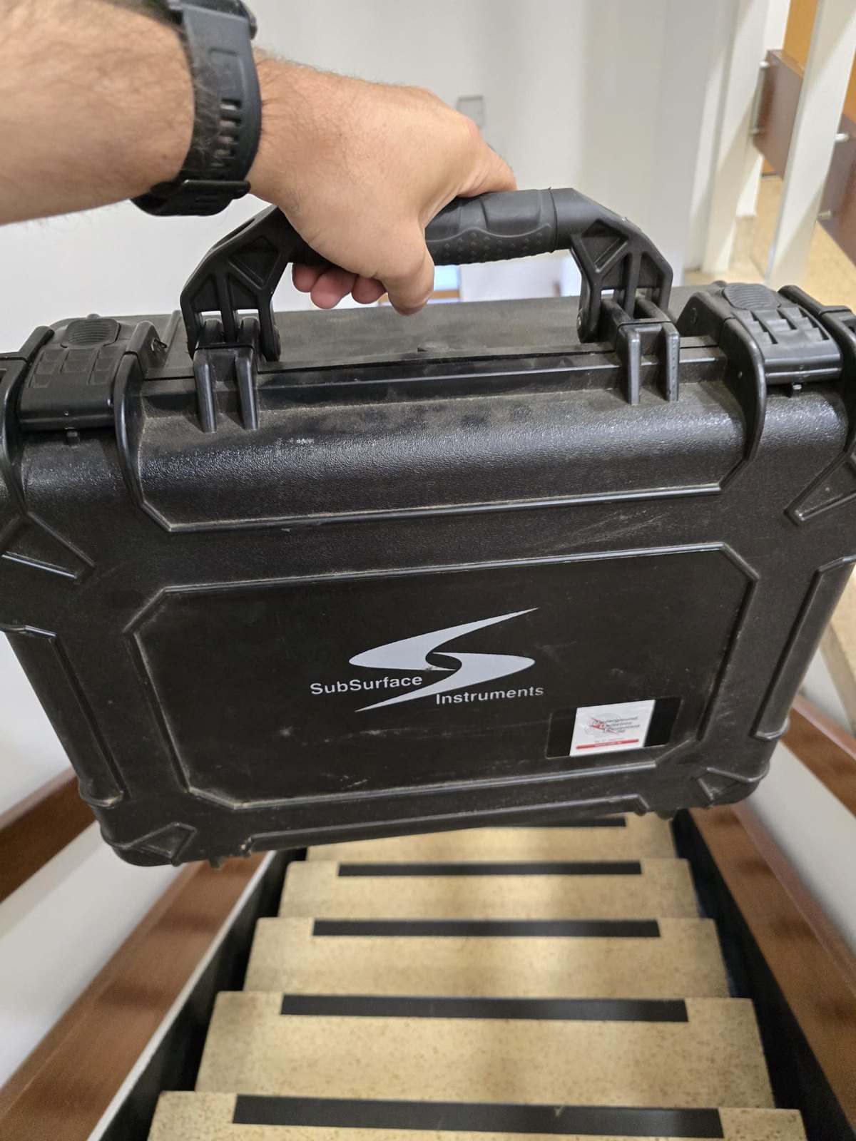 The AML Pro in its SubSurface Instruments hard case, carried by hand