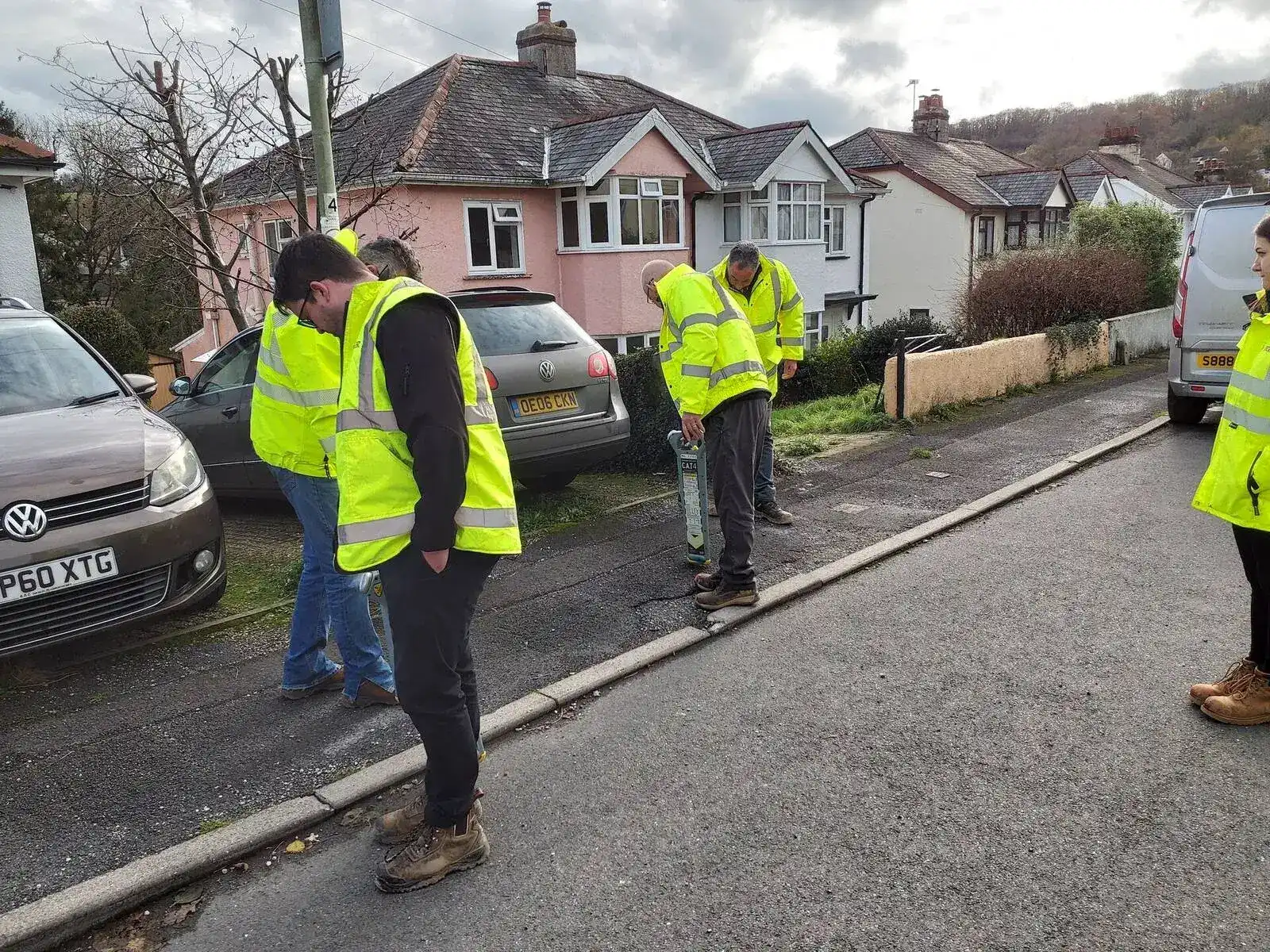 Operative using CAT locator during utility location training